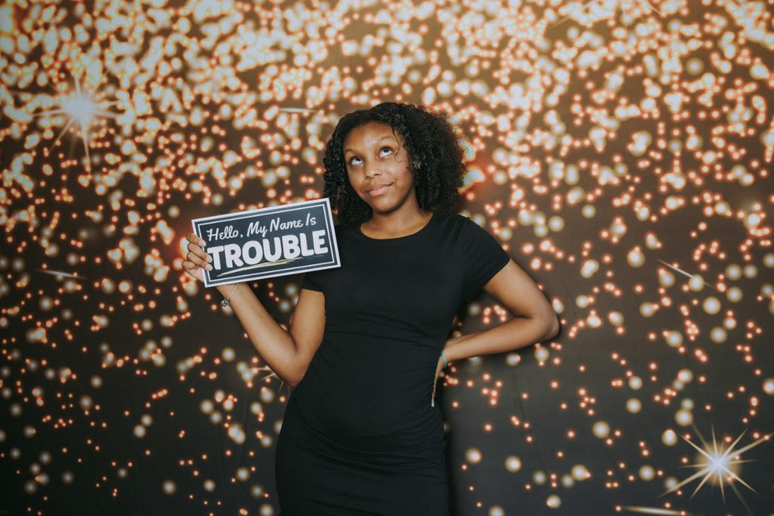 A girl in a black dress.